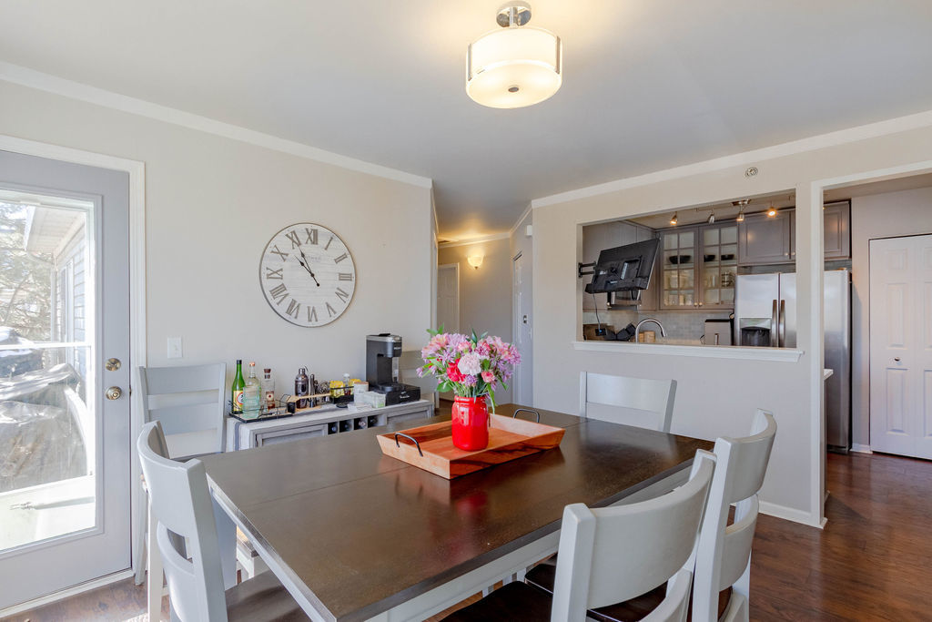 338 Springmist Court Bolingbrook, IL 60440 - Photo 10 of 29 a view of a dining room with furniture and wooden floor
