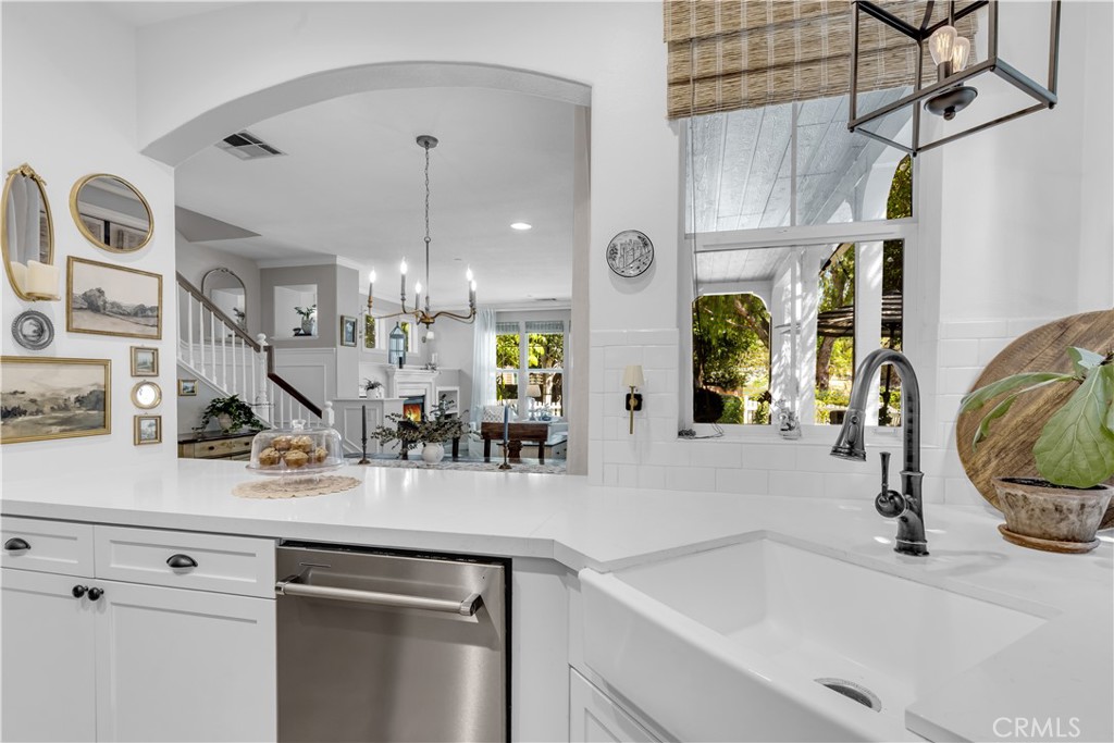 5 Surrey Farm Way Ladera Ranch, CA 92694 - Photo 23 of 46 Remodeled Kitchen opens to dining and living ares