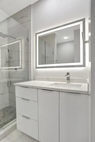 a view of a balcony with chairs