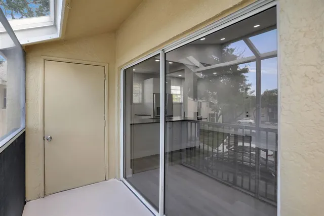 a view of a street from a balcony