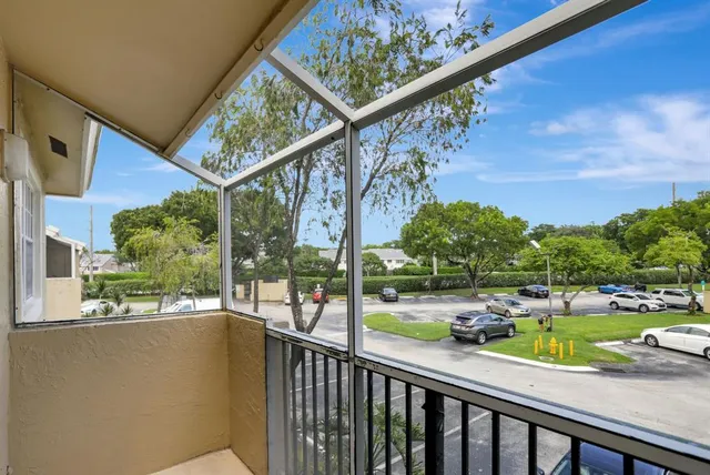 a view of a backyard with a patio