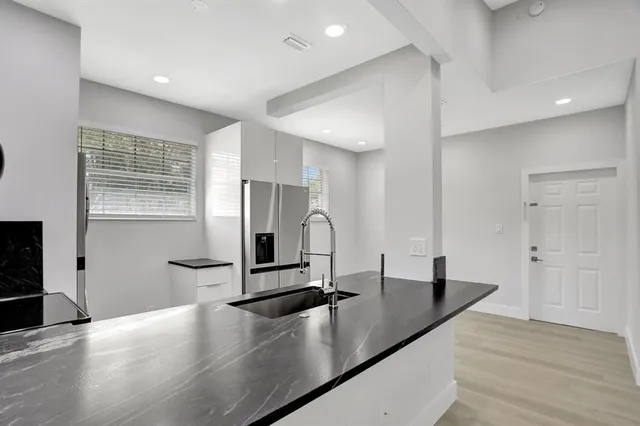 a view of a counter top space with gym equipment
