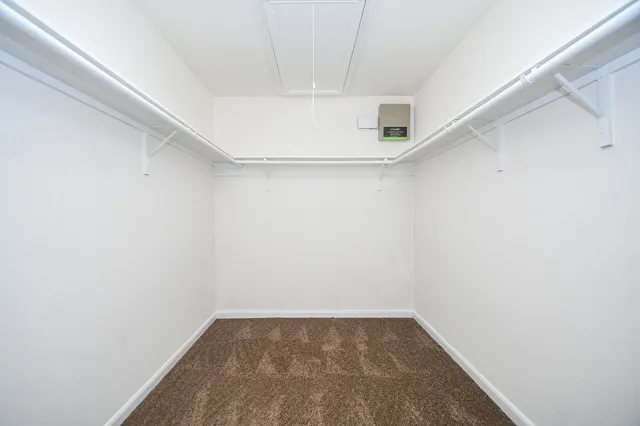 a view of a room with racks on the wall