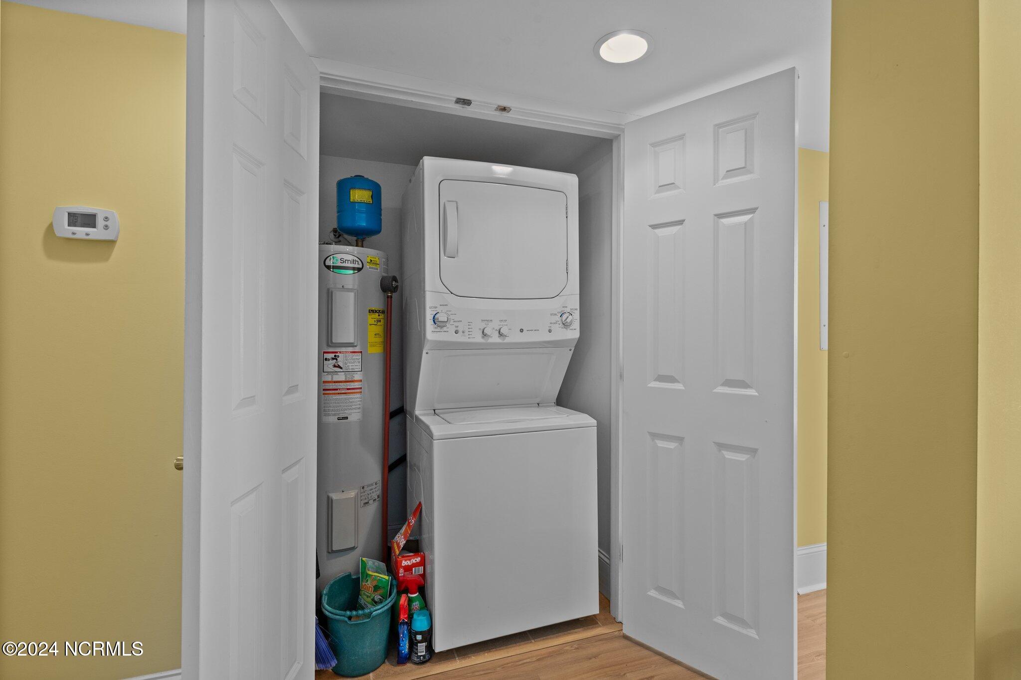 2305 West Fort Macon Road, Unit 206 Atlantic Beach, NC 28512 - Photo 30 of 48 Hallway Laundry Closet