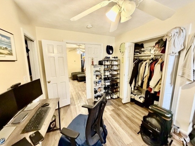 14 Cleveland Place, Unit 2 Boston, MA 02113 - Photo 16 of 18 a view of walk in closet with clothes and shoes