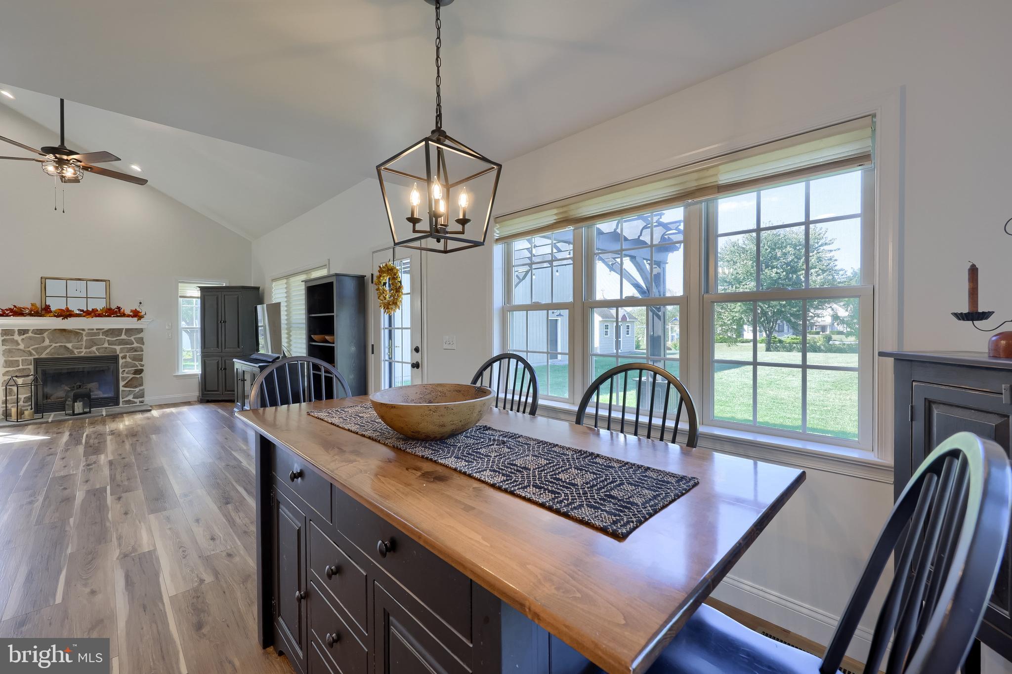 809 West Brubaker Valley Road Lititz, PA 17543 - Photo 15 of 58 a view of a dining room with furniture a chandelier and wooden floor
