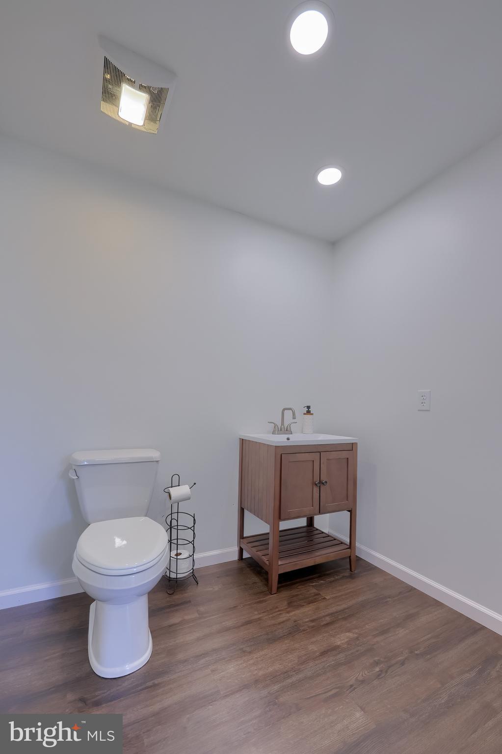 809 West Brubaker Valley Road Lititz, PA 17543 - Photo 36 of 58 a bathroom with a toilet and a sink