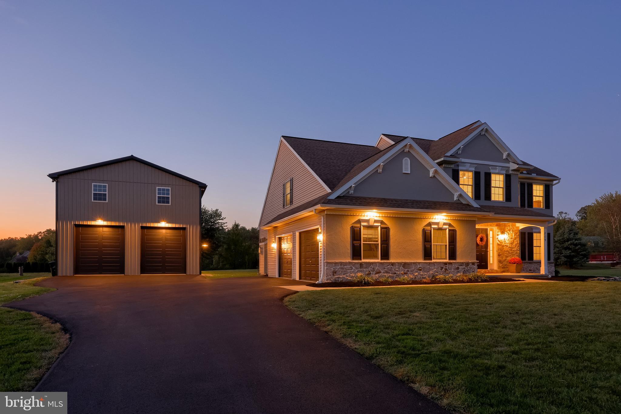 809 West Brubaker Valley Road Lititz, PA 17543 - Photo 46 of 58 a front view of a house with a yard