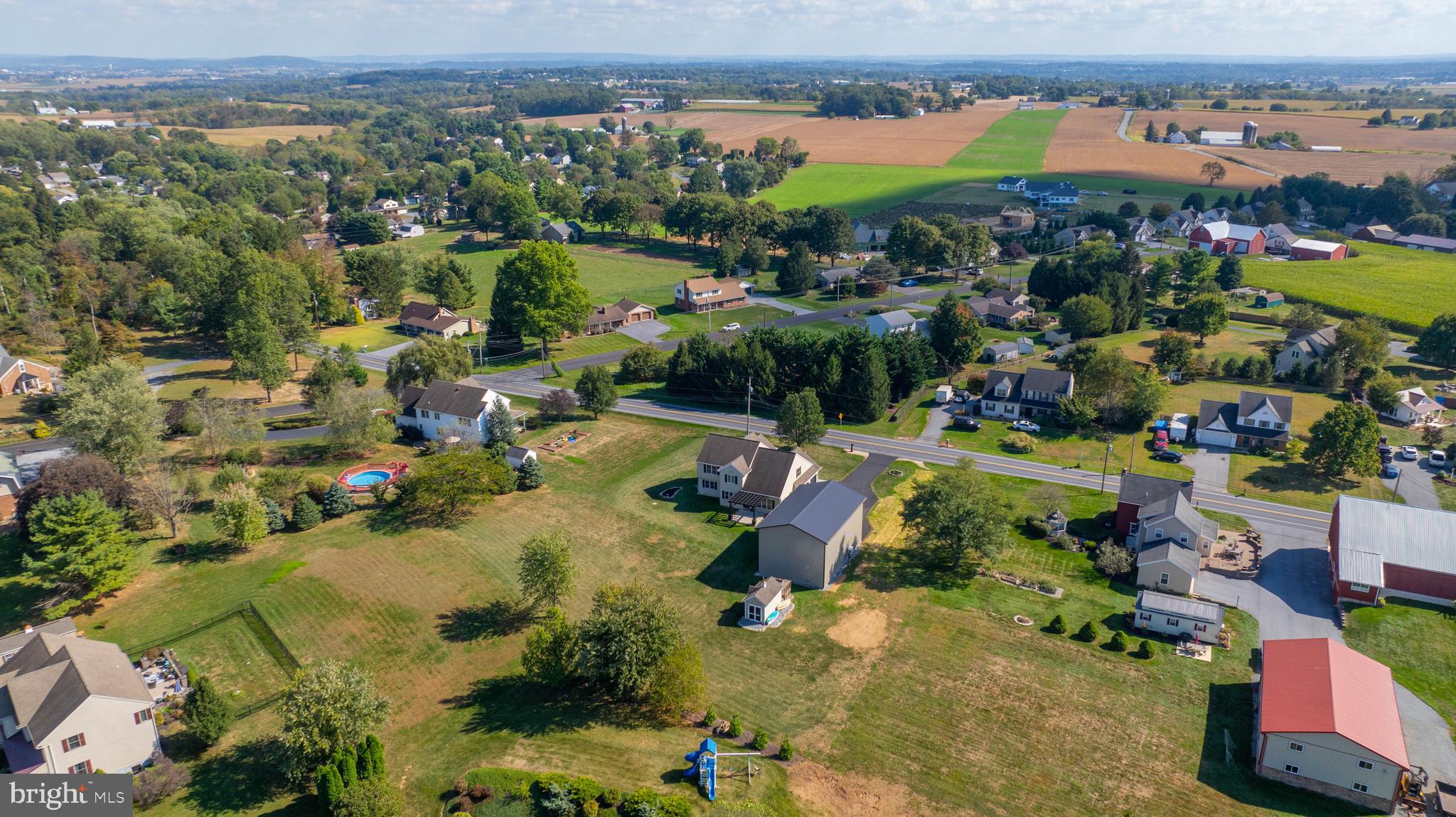 809 West Brubaker Valley Road Lititz, PA 17543 - Photo 58 of 58 an aerial view of residential houses with outdoor space and river