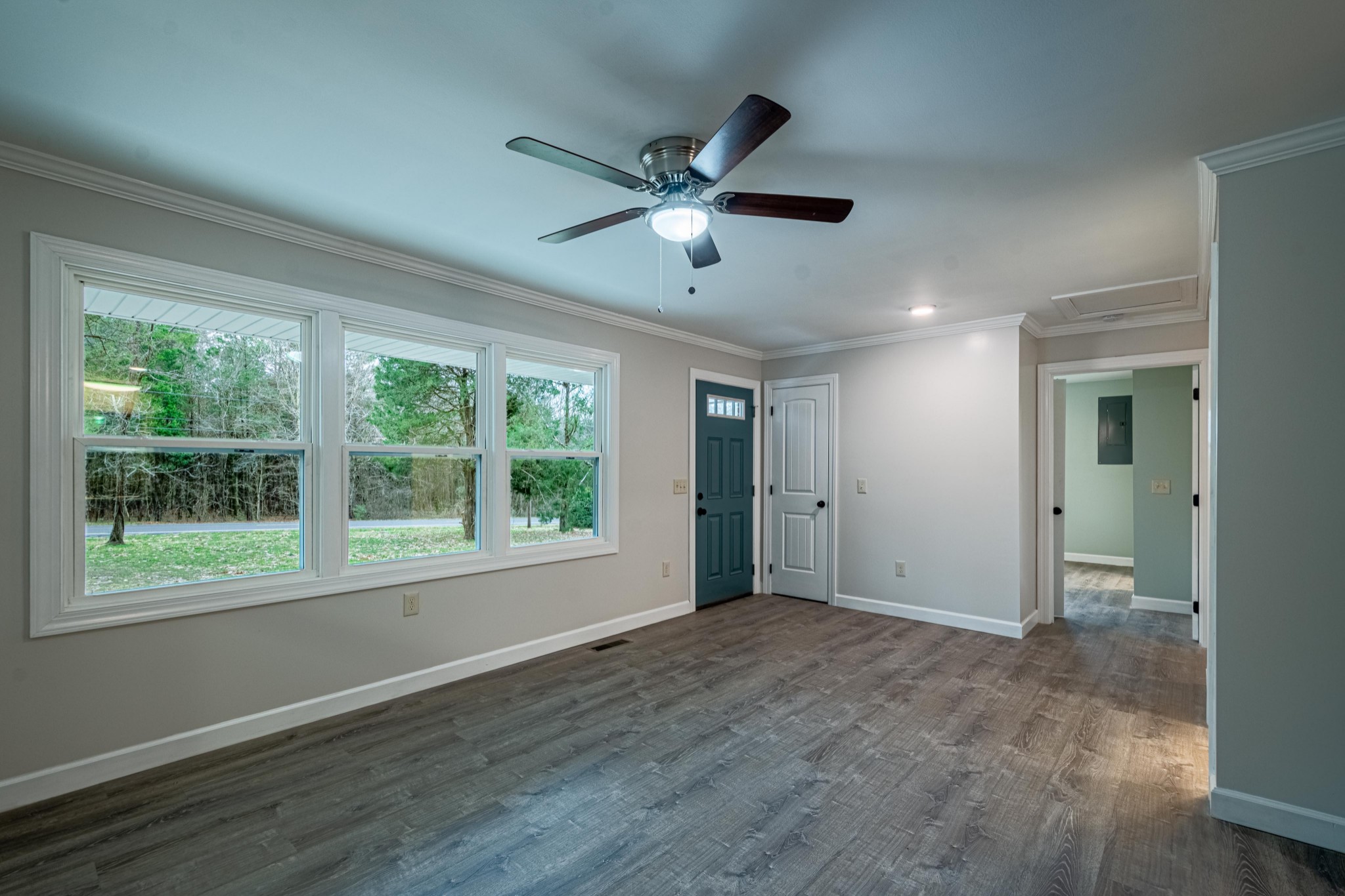 1844 Prospect Elkton Road Prospect, TN 38477 - Photo 13 of 43 a view of an empty room with window and wooden floor