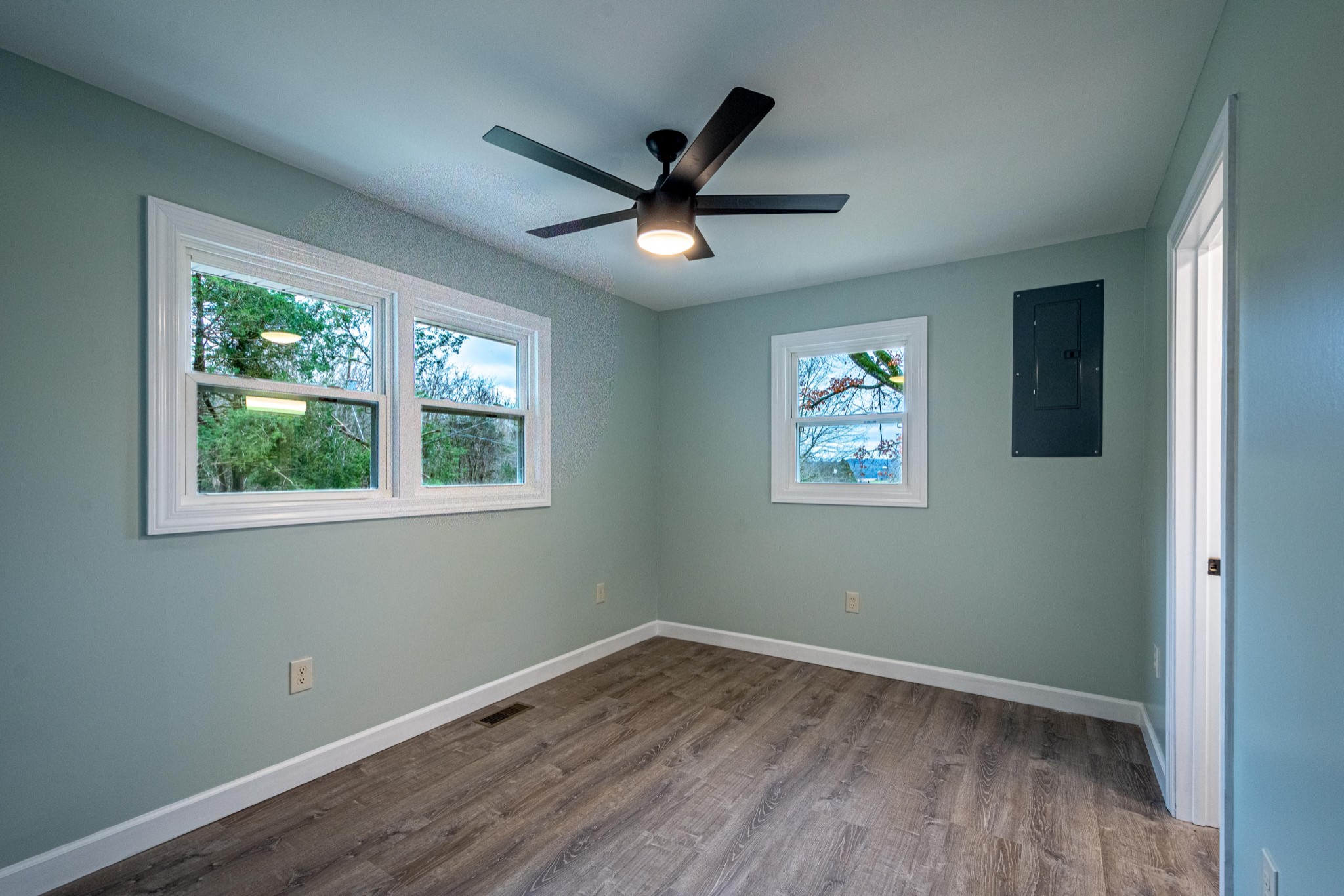 1844 Prospect Elkton Road Prospect, TN 38477 - Photo 19 of 43 a view of empty room with wooden floor and fan