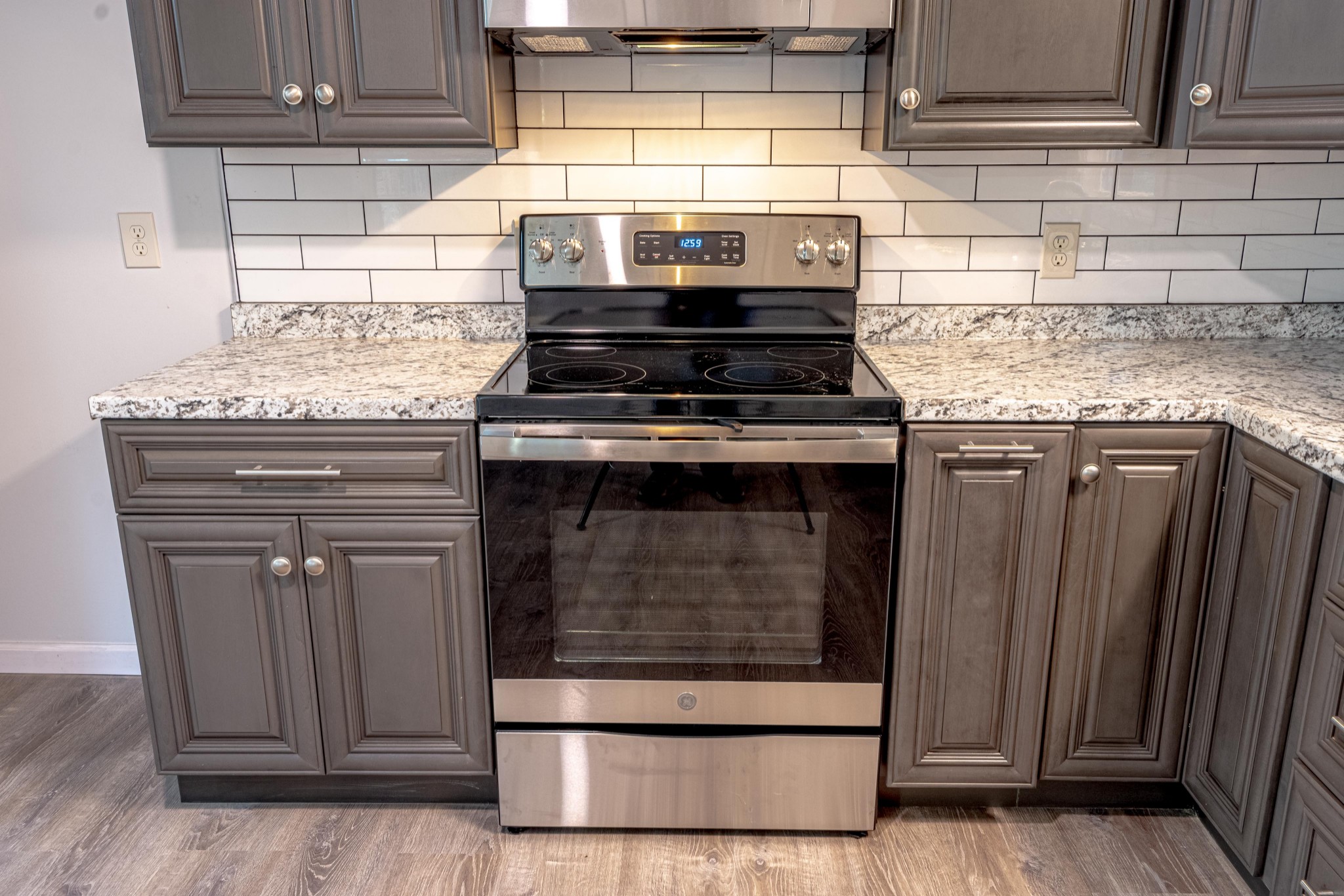 1844 Prospect Elkton Road Prospect, TN 38477 - Photo 8 of 43 a stove top oven sitting inside of a kitchen