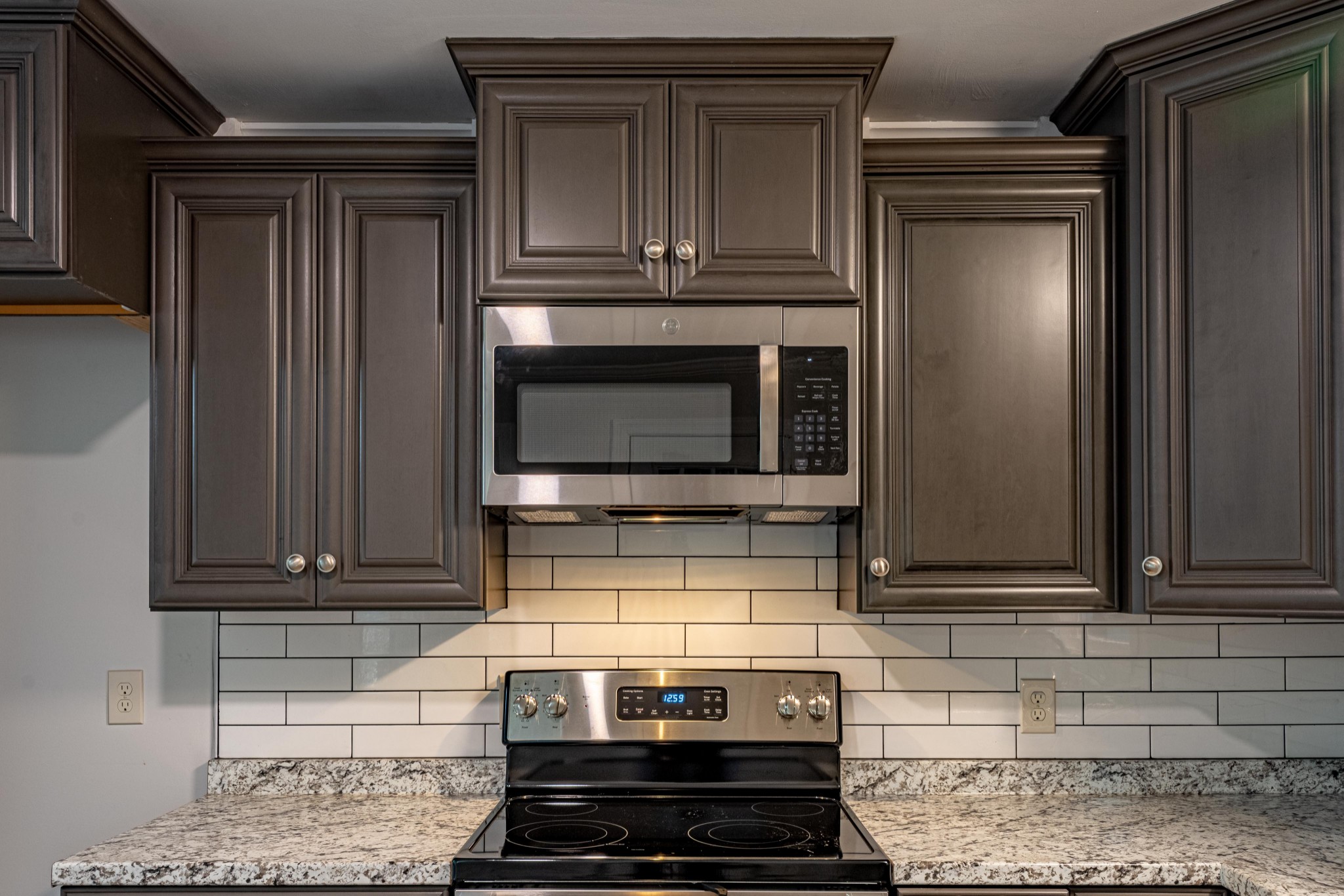 1844 Prospect Elkton Road Prospect, TN 38477 - Photo 9 of 43 a stove top oven sitting inside of a kitchen