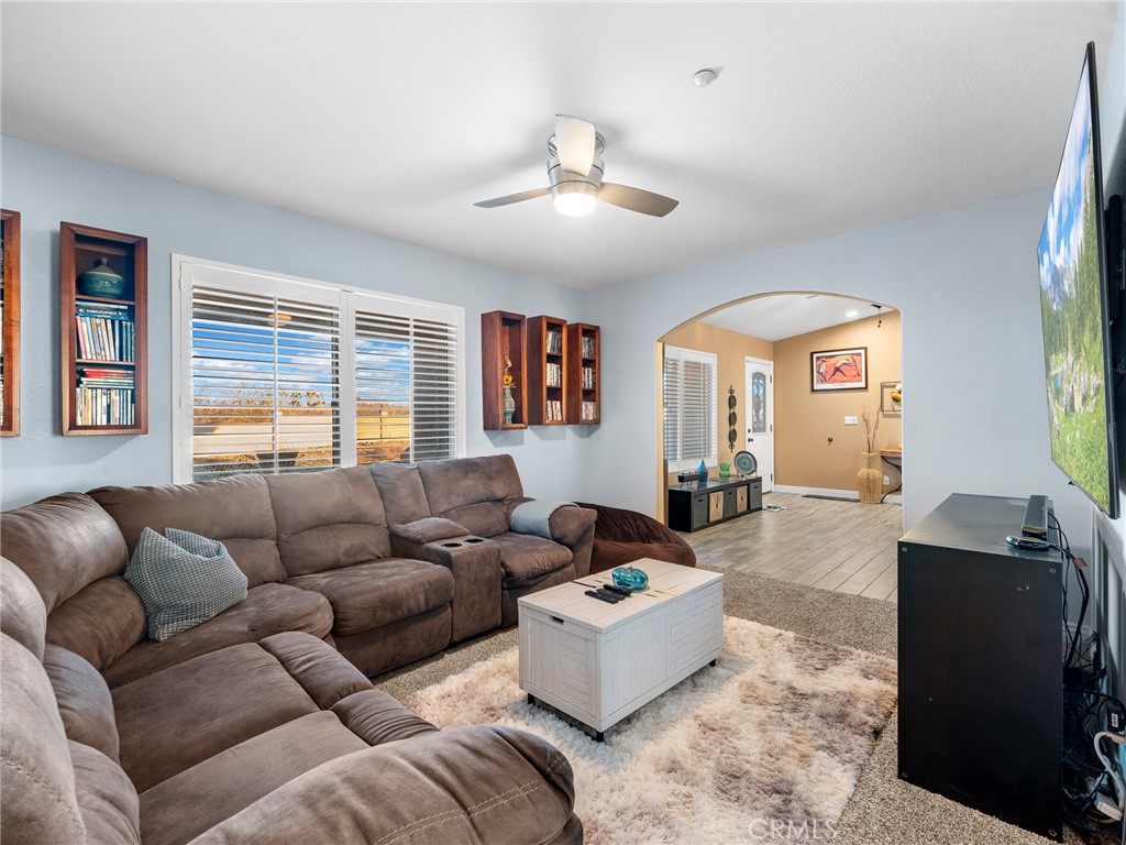 12326 Silver Rock Road Pinon Hills, CA 92372 - Photo 13 of 41 a living room with furniture and a window