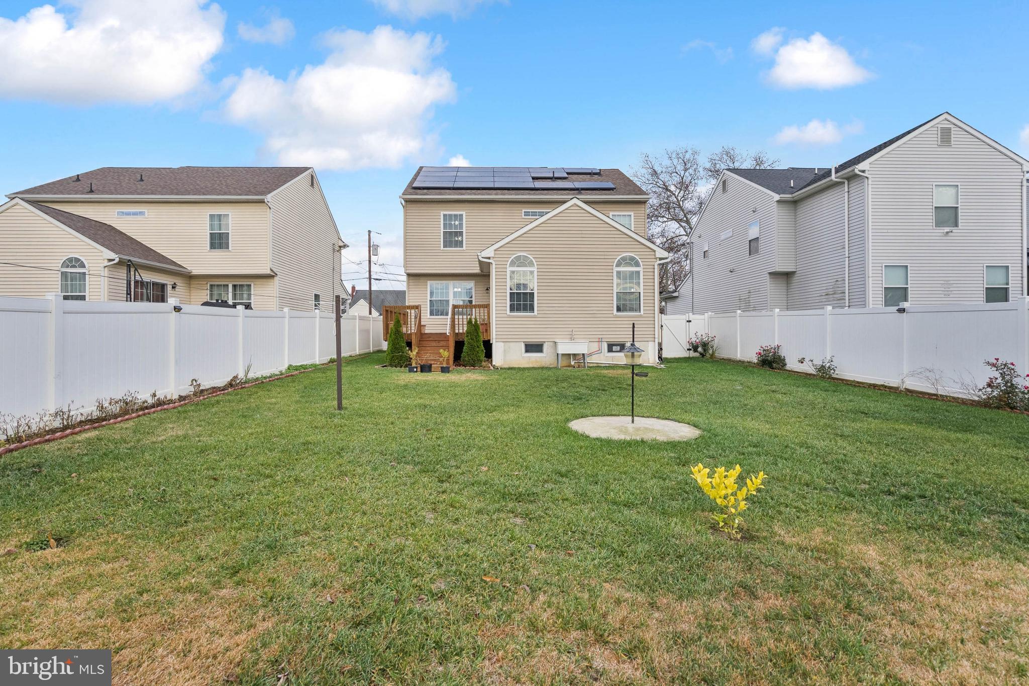 26 North Poplar Avenue Maple Shade, NJ 08052 - Photo 26 of 26 a backyard of a house with table and chairs