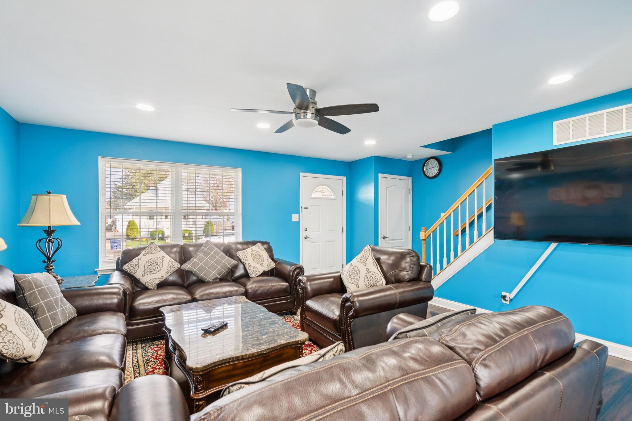 26 North Poplar Avenue Maple Shade, NJ 08052 - Photo 4 of 26 a living room with furniture ceiling fan and a flat screen tv