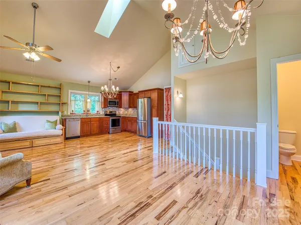 a view of a kitchen and dining room