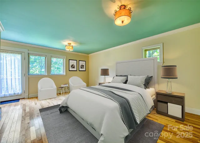 a bedroom with a bed and a lamp with window