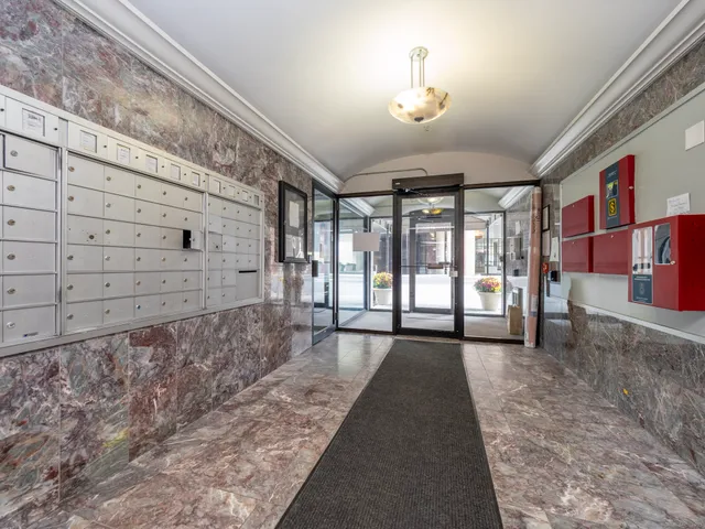 a view of a building with a yard