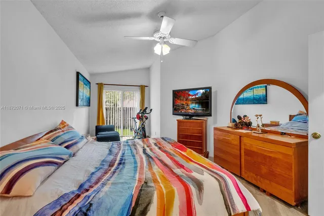 a bathroom with a shower and a toilet