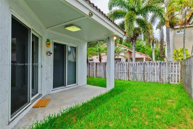 a view of a backyard with a garden