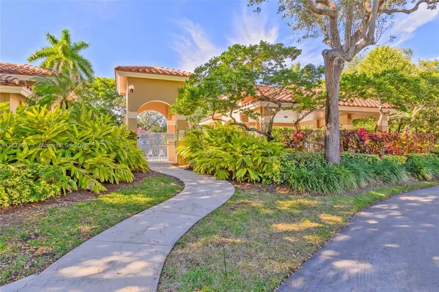 a view of swimming pool with a yard