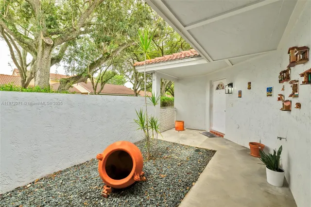 a view of livingroom with furniture and floor to ceiling window