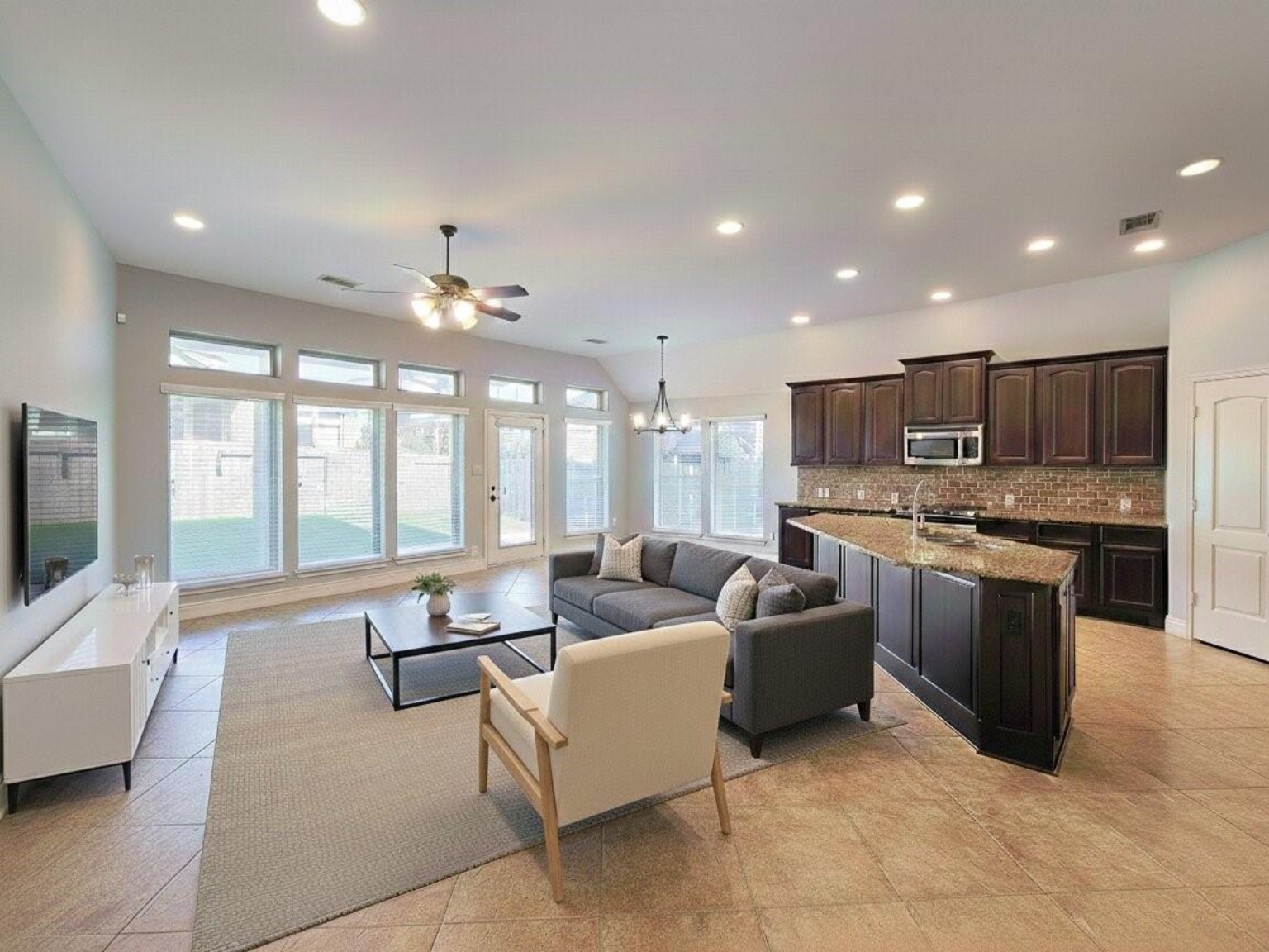 106 Colina Vista Way Montgomery, TX 77316 - Photo 15 of 29 a living room with furniture and a flat screen tv