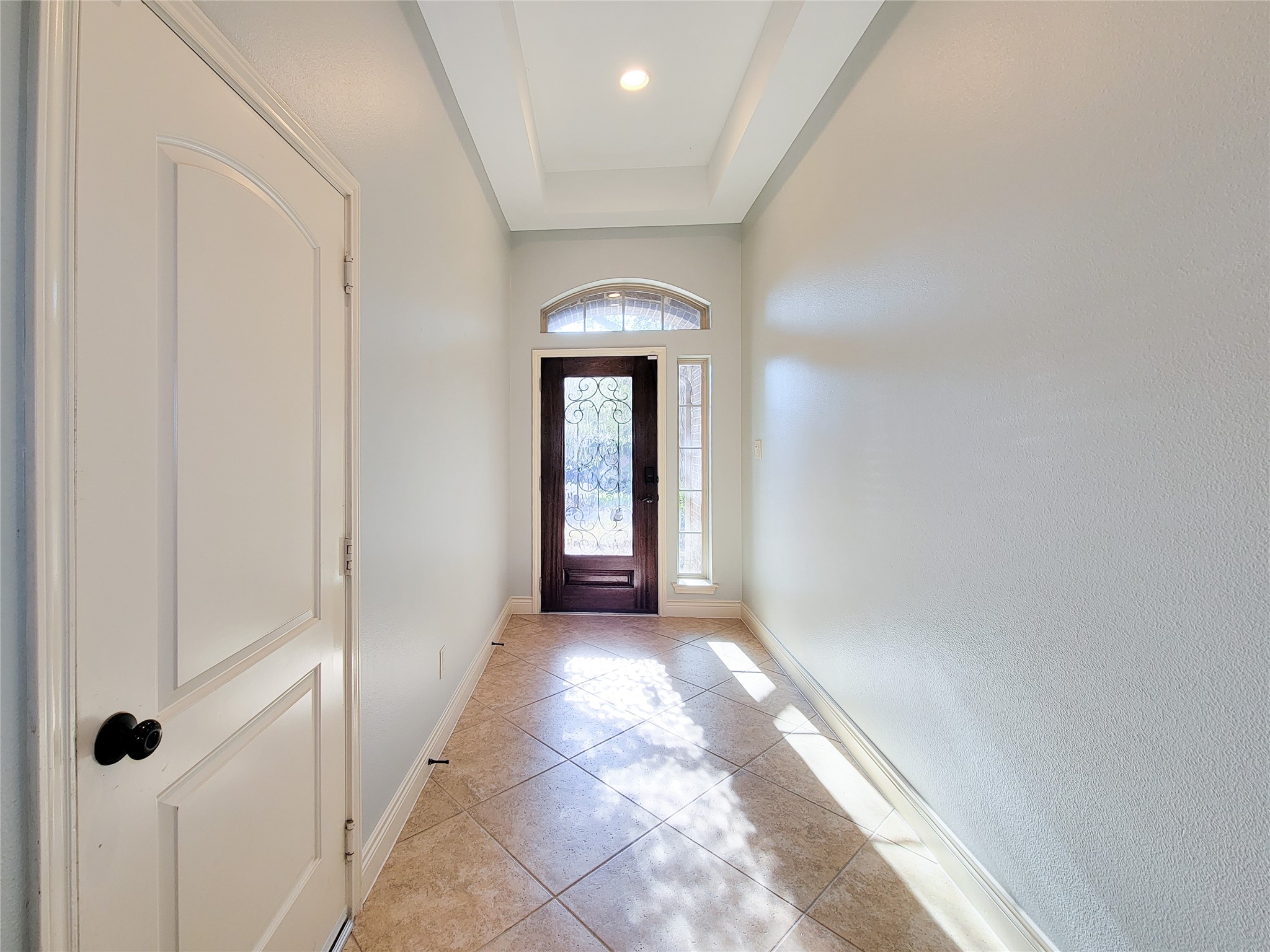 106 Colina Vista Way Montgomery, TX 77316 - Photo 4 of 29 a view of a hallway with wooden floor and a carpet