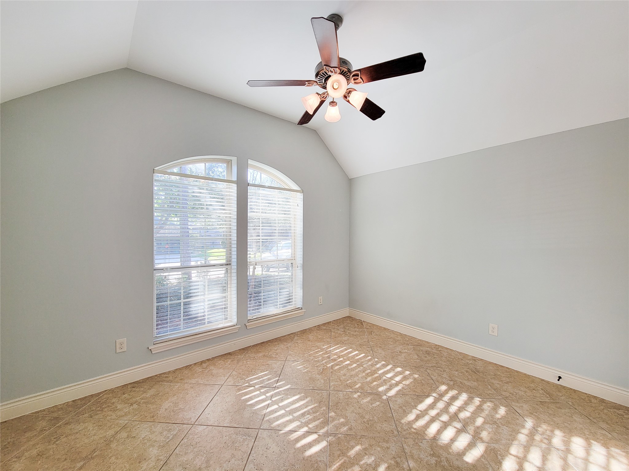 106 Colina Vista Way Montgomery, TX 77316 - Photo 5 of 29 an empty room with windows and fan