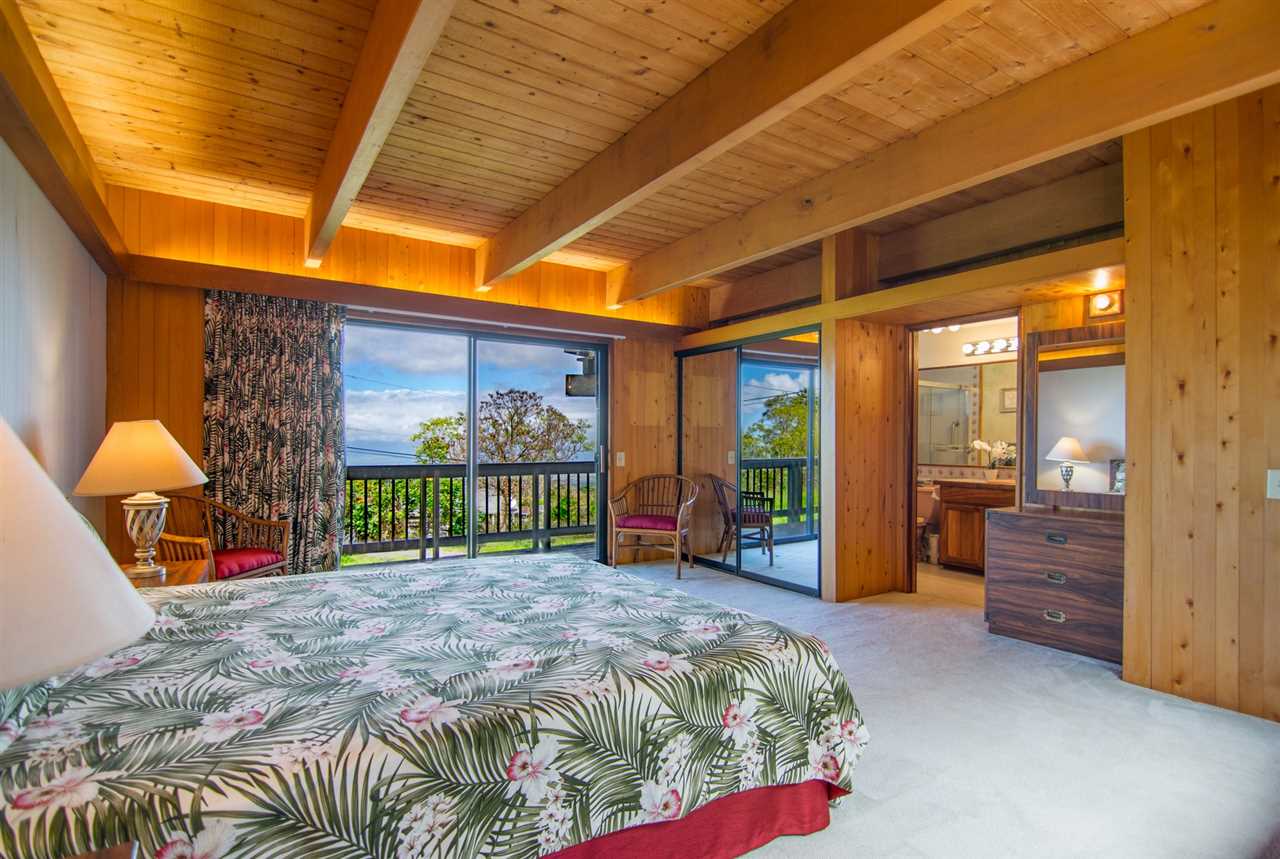 1470 Naalae Road Kula, HI 96790 - Photo 13 of 30 a bed sitting in front of a house
