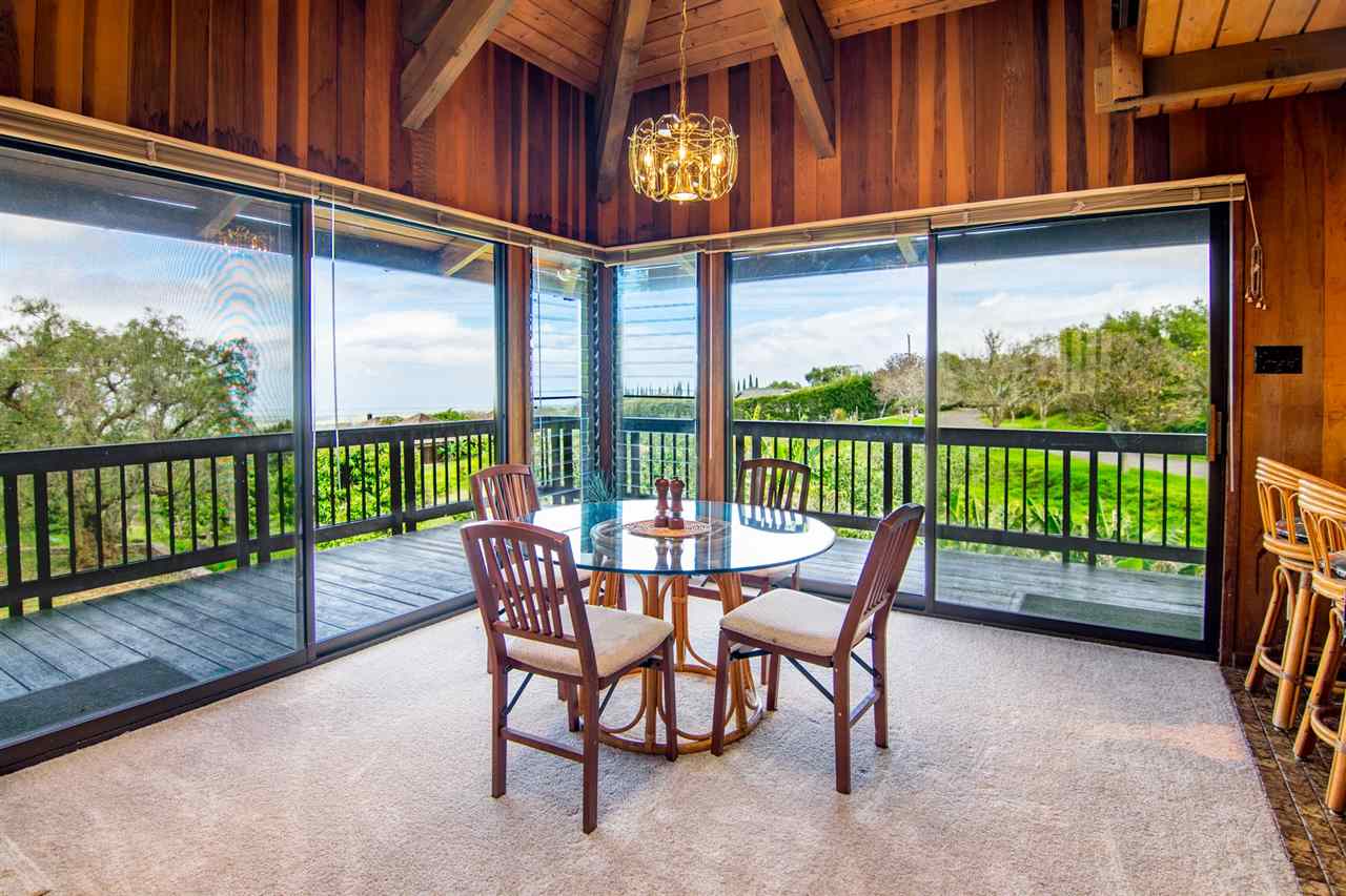 1470 Naalae Road Kula, HI 96790 - Photo 21 of 30 a view of a chairs and table in the balcony