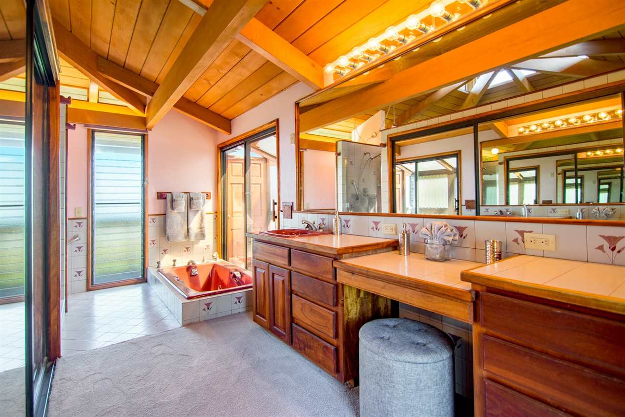 1470 Naalae Road Kula, HI 96790 - Photo 10 of 30 a large room with a large window and furniture