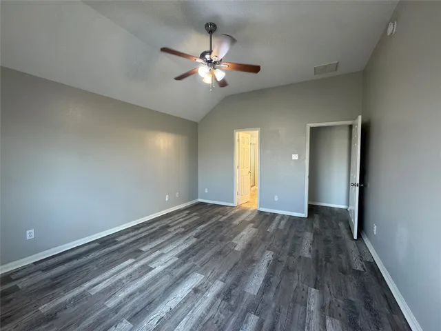 a view of storage and utility room with empty racks