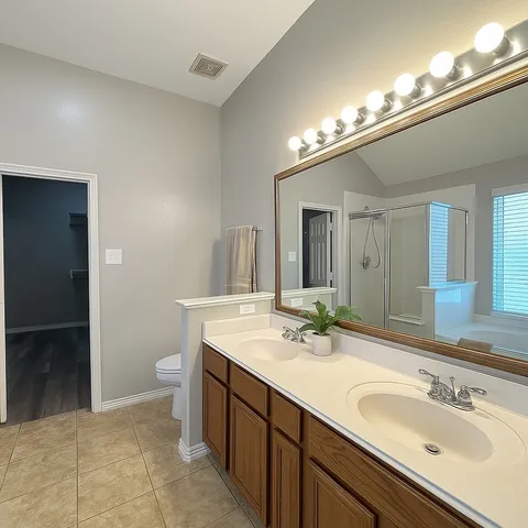 a bathroom with a tub and a toilet