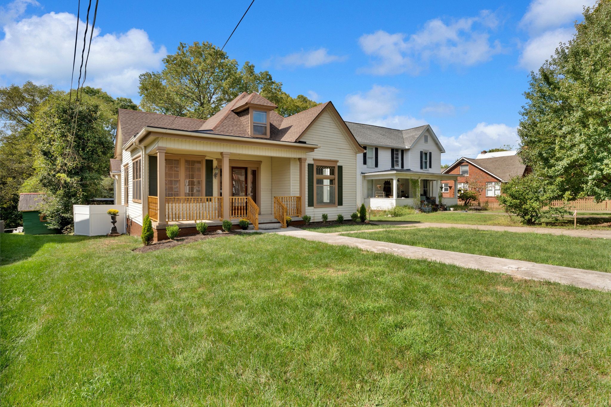 115 North Main Street Springfield, TN 37172 - Photo 2 of 34 a front view of a house with a yard table and chairs
