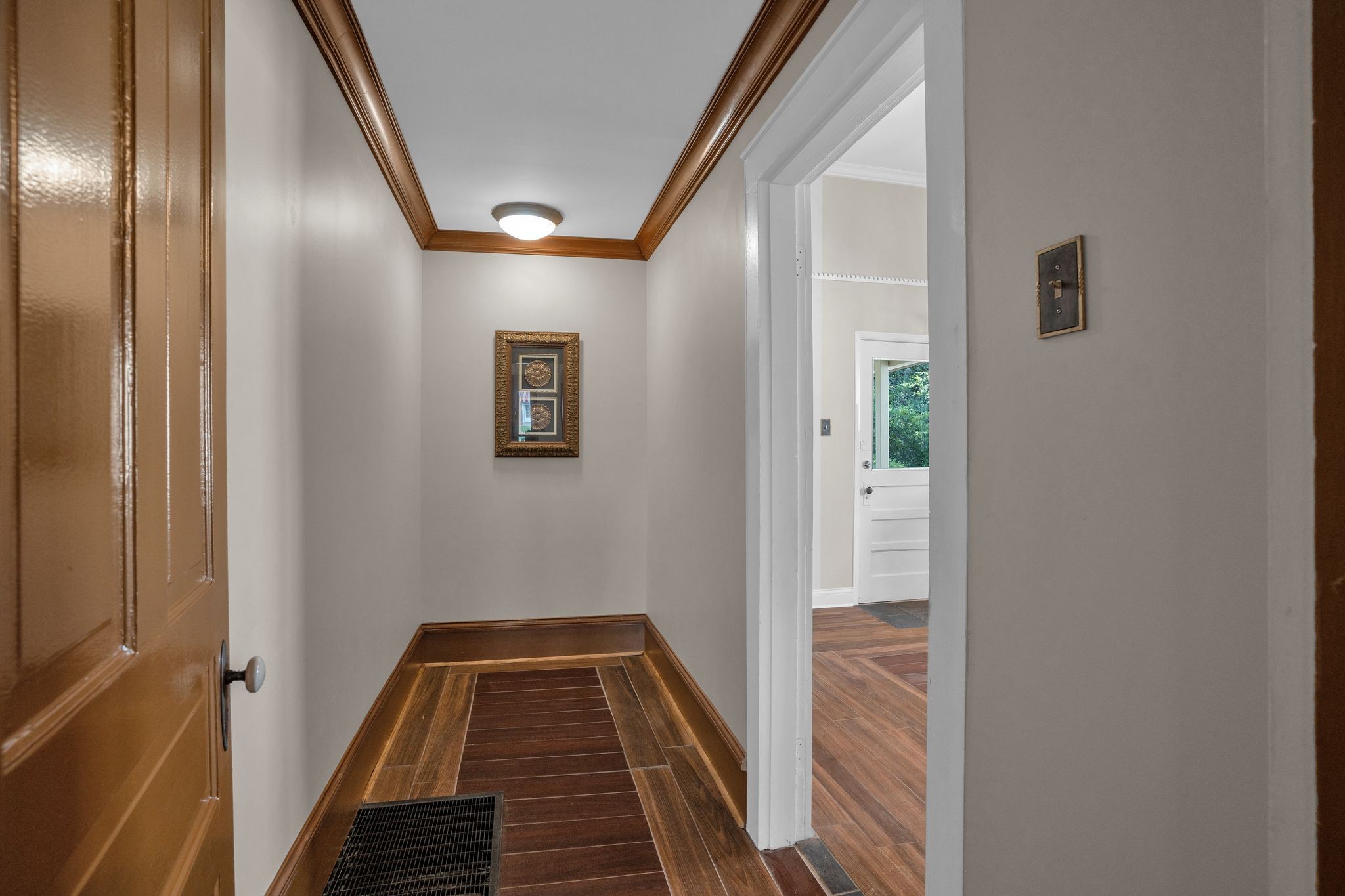 115 North Main Street Springfield, TN 37172 - Photo 24 of 34 a view of a hallway with wooden floor and a bathroom