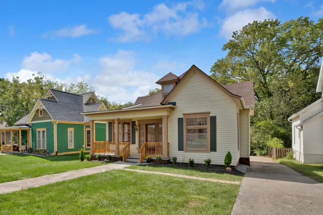 front view of a house with a yard