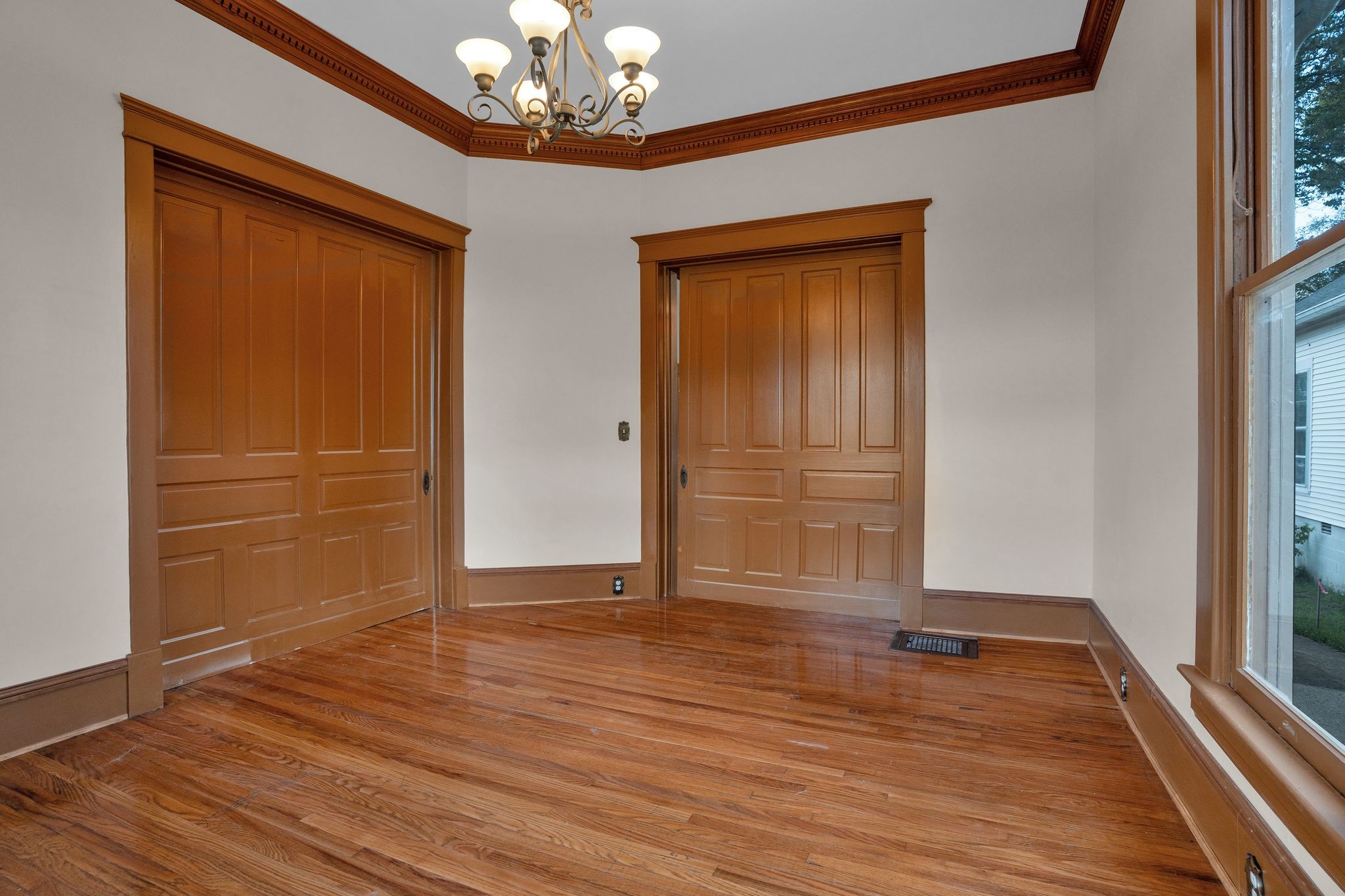 115 North Main Street Springfield, TN 37172 - Photo 9 of 34 wooden floor in an empty room with a window