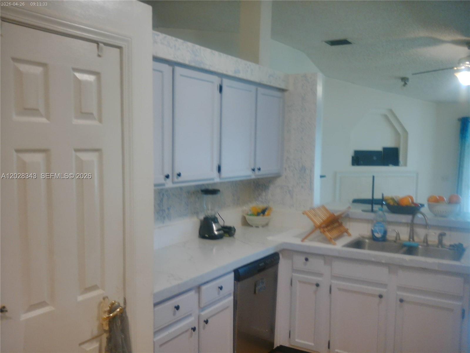 1641 Spring Oaks Lane Jacksonville, FL 32221 - Photo 24 of 44 a kitchen with cabinets appliances and a sink