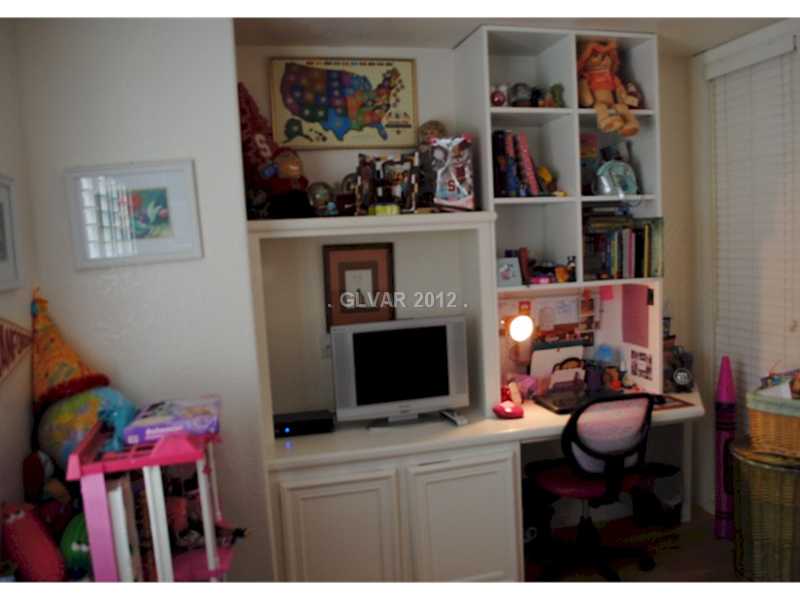 22 Rue De Parc Henderson, NV 89074 - Photo 19 of 32 Den. Built-in desk and storage.