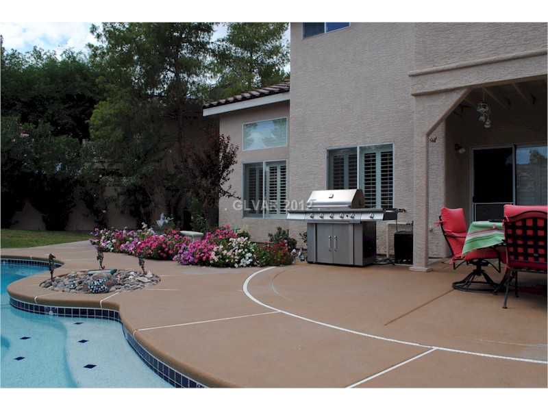 22 Rue De Parc Henderson, NV 89074 - Photo 4 of 32 Exterior Back. Backyard cool deck.