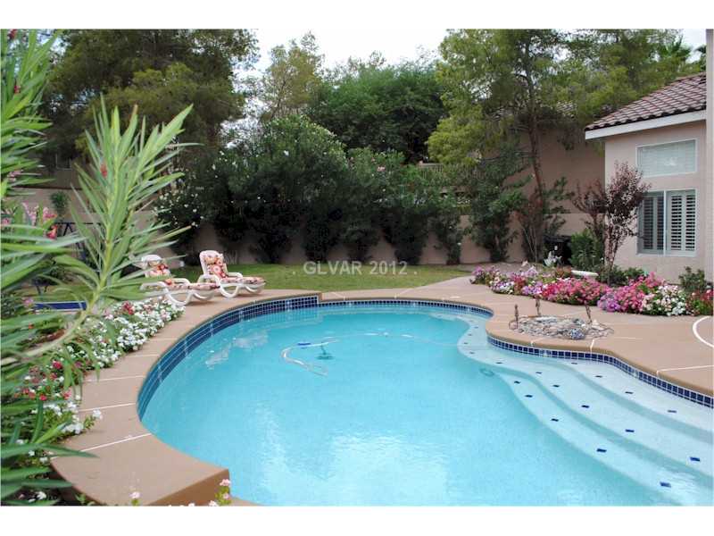 22 Rue De Parc Henderson, NV 89074 - Photo 5 of 32 Swimming Pool/Hot Tub/Sauna. Backyard Blue Pebble Tech Pool.