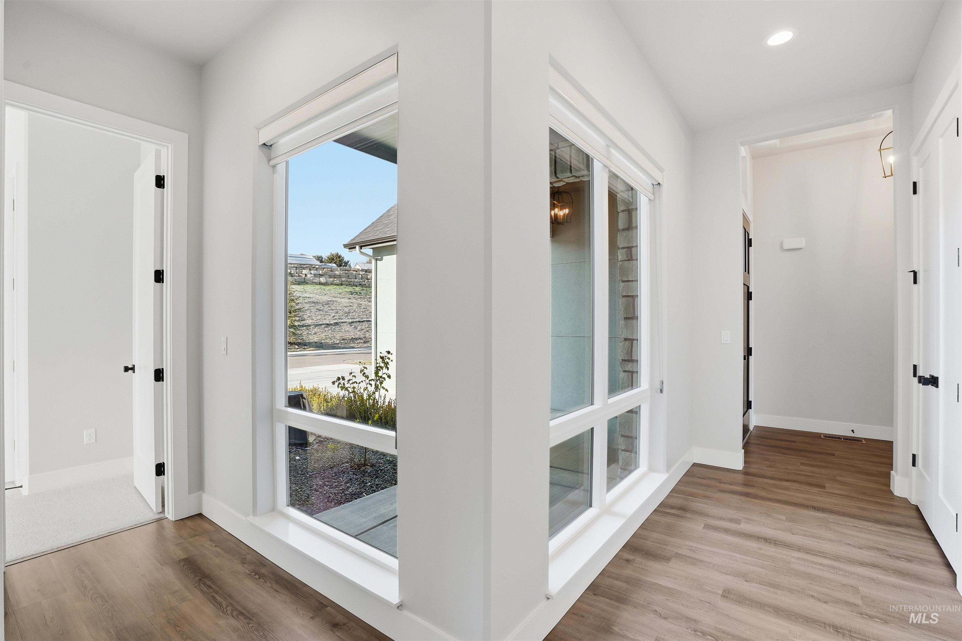 2976 East Parulo Drive Meridian, ID 83642 - Photo 31 of 40 Entryway with wood finished floors and recessed lighting