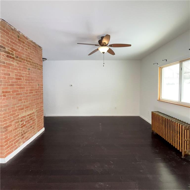 1360 Center Street McKees Rocks, PA 15136 - Photo 4 of 18 an empty room with windows