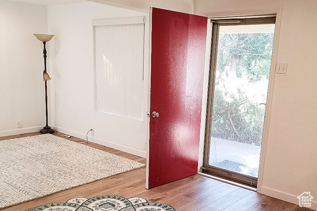 2855 South 1000 West Perry, UT 84302 - Photo 35 of 142 Doorway to outside with wood finished floors and baseboards
