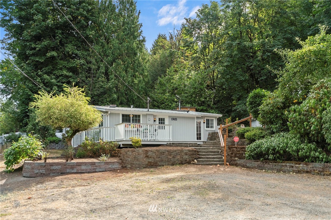 17415 Renton Issaquah Road Southeast Renton, WA 98059 - Photo 2 of 37 front view of house with a yard