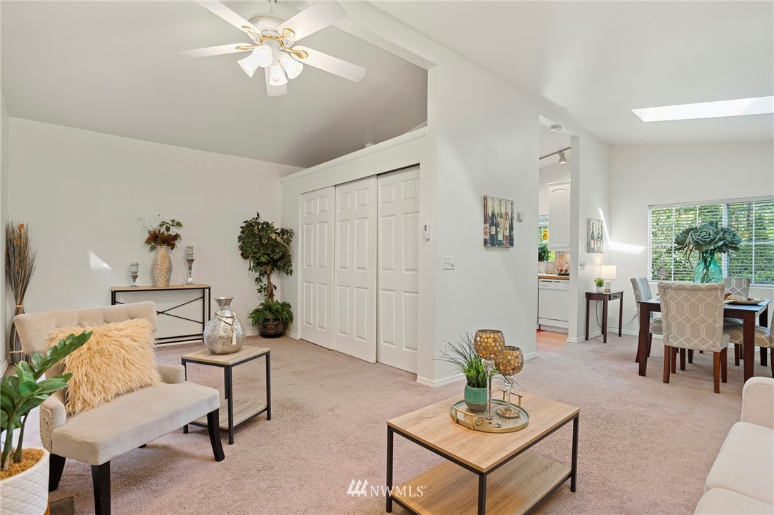 17415 Renton Issaquah Road Southeast Renton, WA 98059 - Photo 13 of 37 a living room with furniture and a potted plant