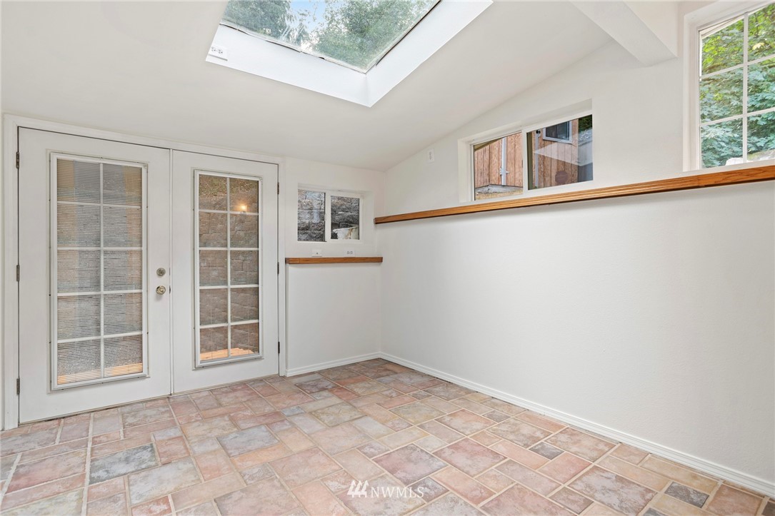 17415 Renton Issaquah Road Southeast Renton, WA 98059 - Photo 20 of 37 a view of empty room with windows