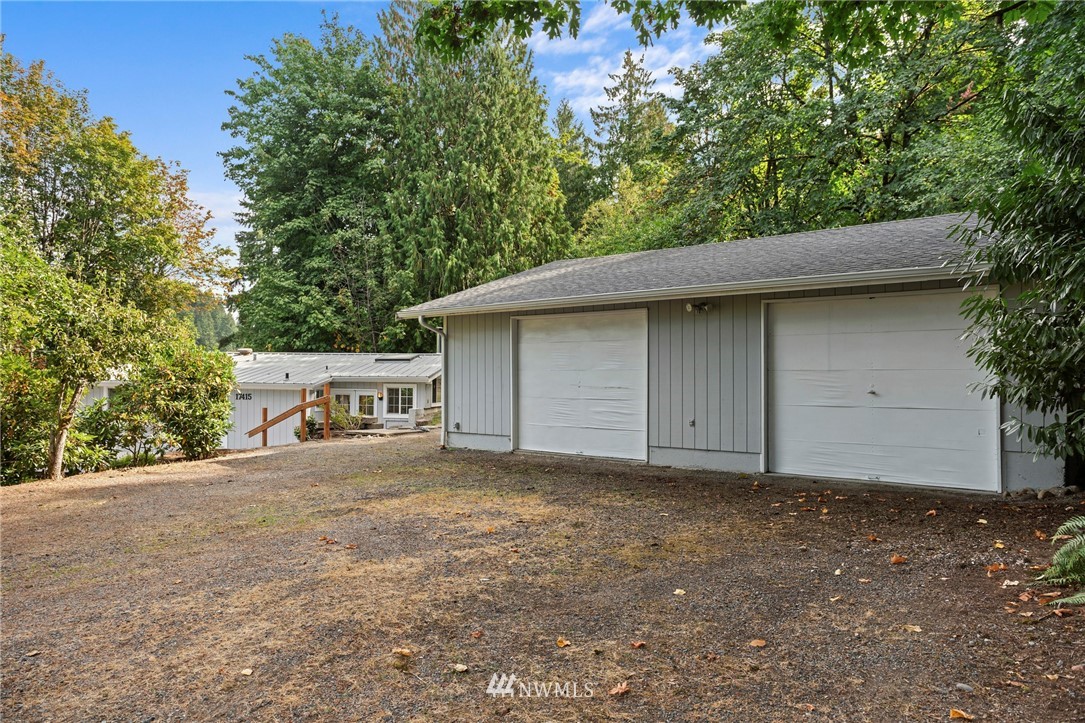 17415 Renton Issaquah Road Southeast Renton, WA 98059 - Photo 28 of 37 a house with trees in the background